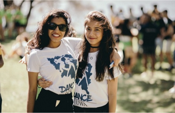 2 students smiling
