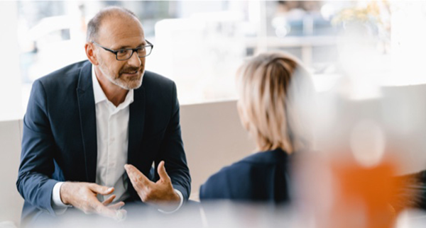 Industry mentor talking to student